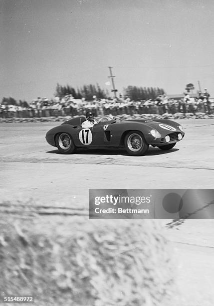 World champion racing driver Juan Manuel Fangio of Argentina drives his way to victory in the Grand Prix of Endurance race at Sebring.