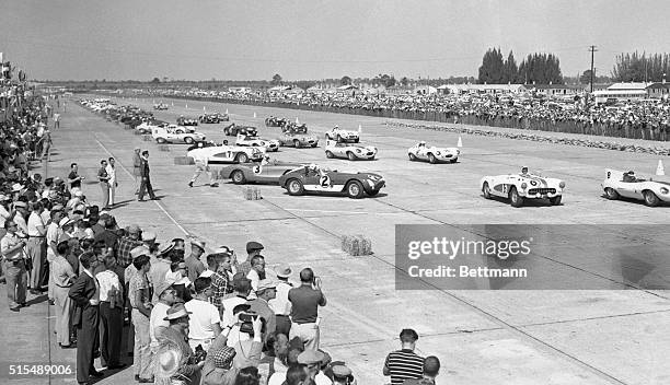 Racing cars roar down the track at the start of the 6th annual Grand Prix of Endurance sports car race at Sebring. Juan Fangio won the 12 hour event...