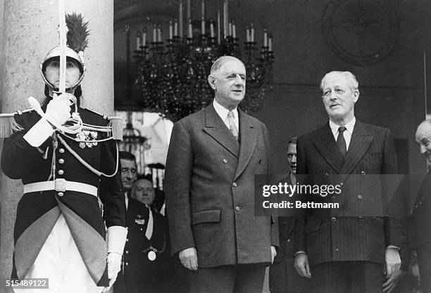 Paris, France- French President Charles De Gaulle and British Prime Minister Harold MacMillan , standing together here for a last photo before...