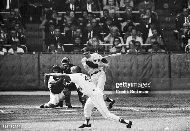 Phil Linz, New York Yankee infielder, loops a broken bat single off World Series pitching hero Bob Gibson of the St. Louis Cardinals, in the third...