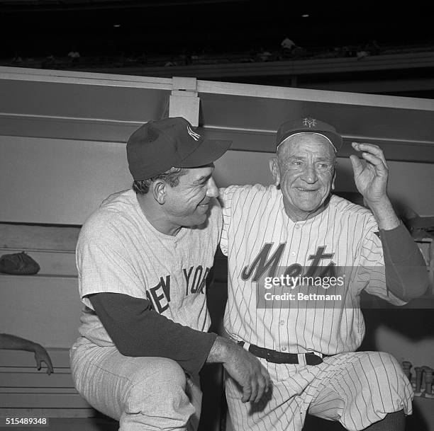 New York Yankee manager Yogi Verra and New York Met manager Casey Stengel swap stories, August 24th, before their teams meet in the annual Mayor's...