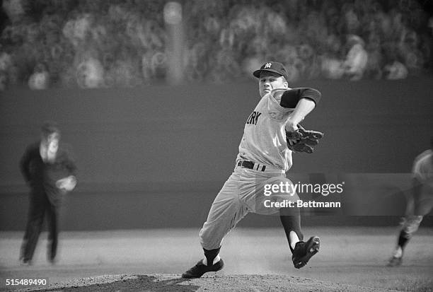 Busch Stadium: A determined Yankee is Jim Bouton, shown as he pitches against Cardinals in 6th game of World Series.