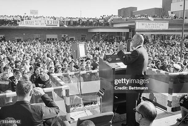 During a speech to a large crowd, President Lyndon B. Johnson urges voters to join him in an "American breakthrough." Later, the Chief Executive left...