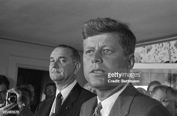 John F. Kennedy campaigning with Lyndon Johnson.