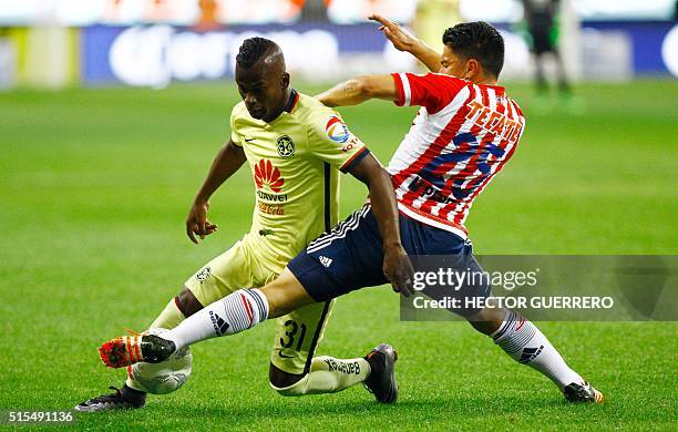 Michael Perez of Guadalajara vies for the ball with Darwin Quintero of America during their Mexican Clausura 2016 tournament football match at...