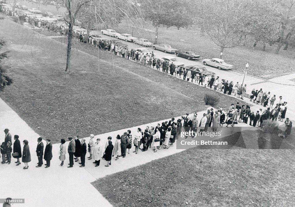 Long Voting Lines Curving Around Sidewalks