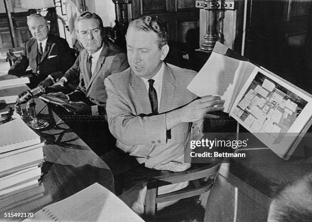 Attorney General Waggoner Carr and Governor John Connally of Texas show reporters the results of their investigation into the shooting of President...