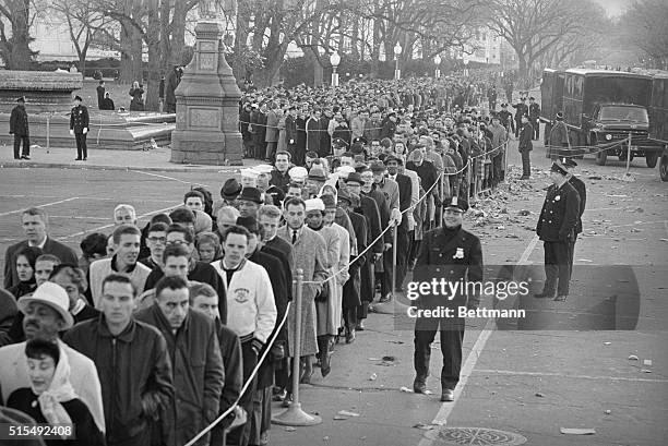 Long lines of grieving citizens still wait November 25th to pay last respects to President Kennedy. The Capitol rotunda was kept open all night but...