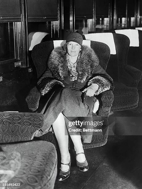 Flying Bride of Prominent Publisher. New York City: Pictured above is "Miss Amelia Earhart," as she will continue to be known on a train at...