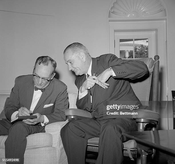 Optimistic Report. Washington, DC: President Johnson confers at the White House today with Thomas Mann, Assistant Secretary of State for...