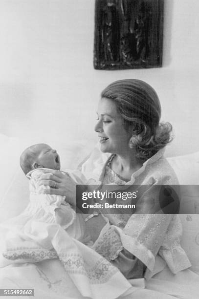 Princess Holds Her Princess. Monte Carlo, Monaco: Princess Grace of Monaco holds her four-day-old daughter, Princess Stephanie, at the Palace of...