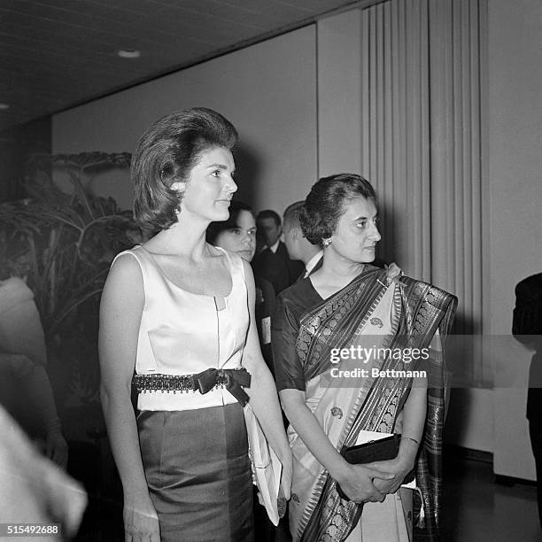 Mrs. John F. Kennedy, widow of the late President, attends the opening of the exhibition of the life of the late Indian Prime Minister Jawaharlal...