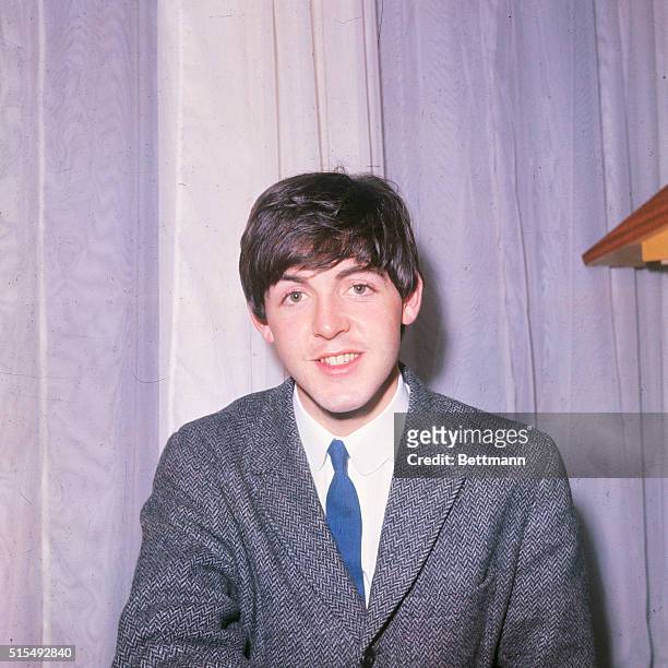 Filed 1963-London, England: Head and shoulders of Beatles' bassist Paul McCartney. He is wearing a tweed jacket and a tie.
