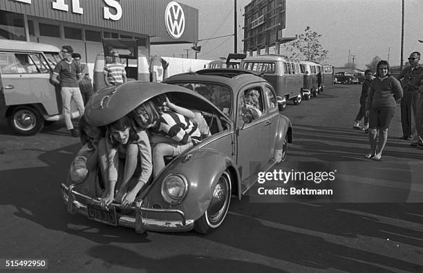 With the silly season upon us again a group Laudra Vista Junior High students from Fullerton, California, try to set a new record in car packing;...