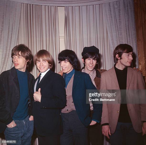 The Rolling Stones holding press conference in the Emerald Room at the Hotel Astor. Left to right: Mick Jagger, Brian Jones, Bill Wyman, Keith...