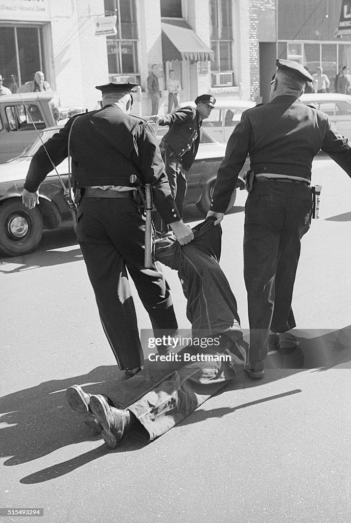 Police Dragging African-American Man