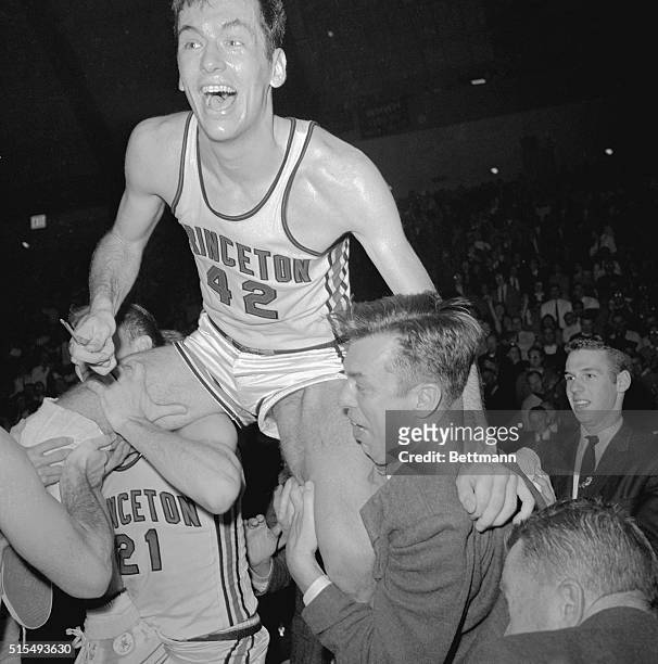 Bill Bradley being Carried by Teammates After Princeton defeated NC State 66 -48 in the semifinals of the East Region of the NCAA Basketball...