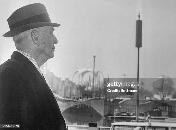 Robert Moses, President of the New York World's Fair looks over the scene of his largest project. 4/20 as final touches were put into the opening day...