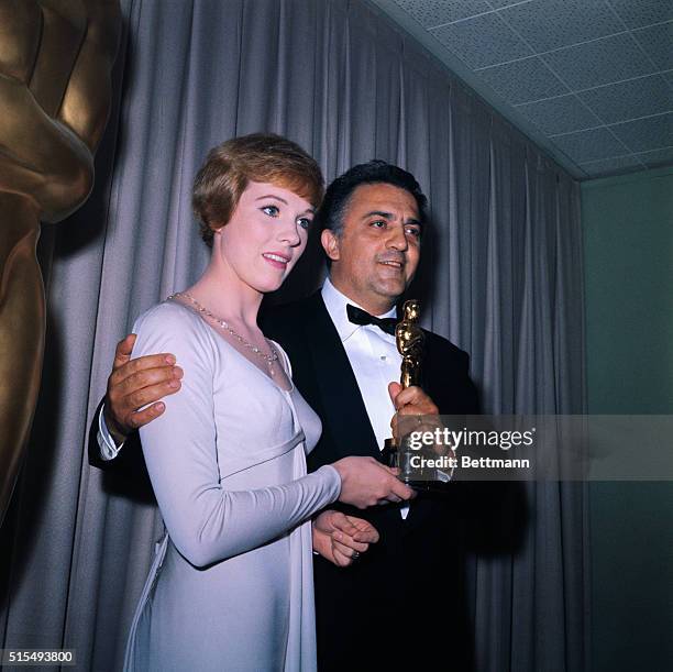 Academy Award Presentations. Hollywood, California: Actress Julie Andrews presents award for "Best Foreign Language Film of the Year" to Italian...