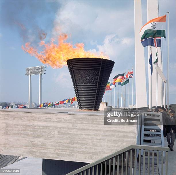 Olympics-Tokyo Japan: The Olympic torch is lit during practice at the Kamazawa National Stadium.