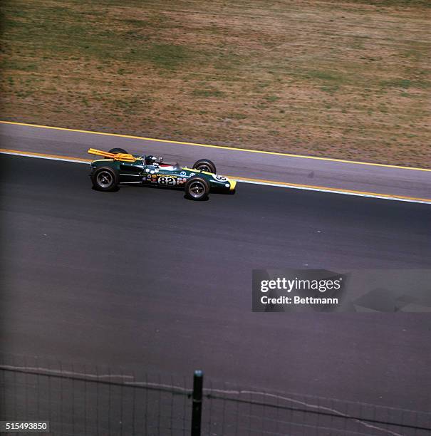 Indianapolis, IND.: Britain's Jim Clark, driving car, a Lotus Ford, during Indianapolis "500" May 31. Mr. Clark was eventual winner of race.