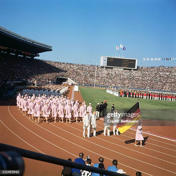 Tokyo, Japan: The German Team marches onto the field during opening ceremonies of the 1964 Olympiad.