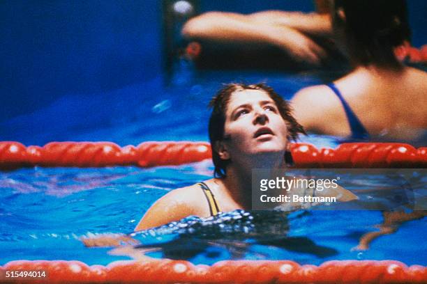 Tokyo, Japan, Australian Dawn Fraser after splashing her way to victory in the 100 meter free syle event. She won for the third consecutive time, in...