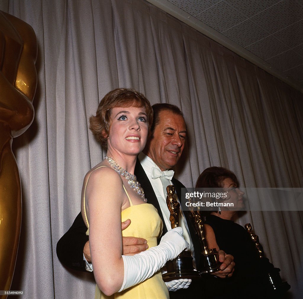 Oscar Winners Julie Andrews and Rex Harrison Hold Their Awards