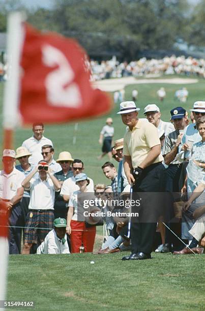 Augusta, Ga.: Jack Nicklaus lines up a chip shot from the fringe of the green on the second hole in the second round of the Masters Tournament at...