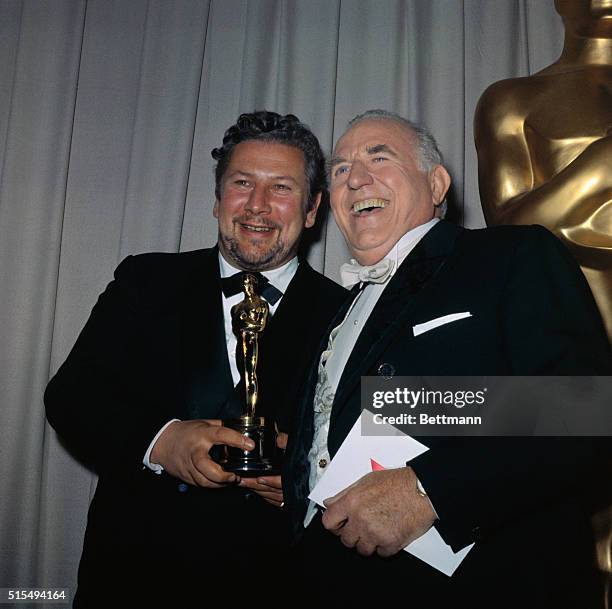 Academy Award Presentations. Hollywood, California: Ed Begley presents Oscar for best performance by an actress in a supporting role to Margaret...