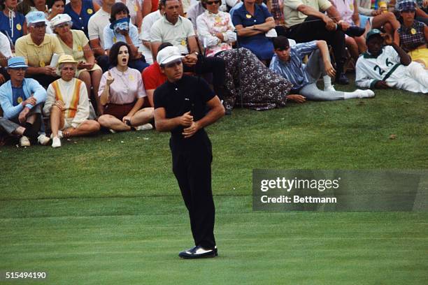 Augusta, Ga.: Gary Player watches the ball after putting on the 18th Green in the final round of the Masters Tournament today. The ball failed to...