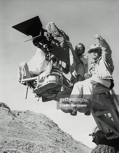 James Wong Howe Demonstrating Shooting Capabilities, News Photo