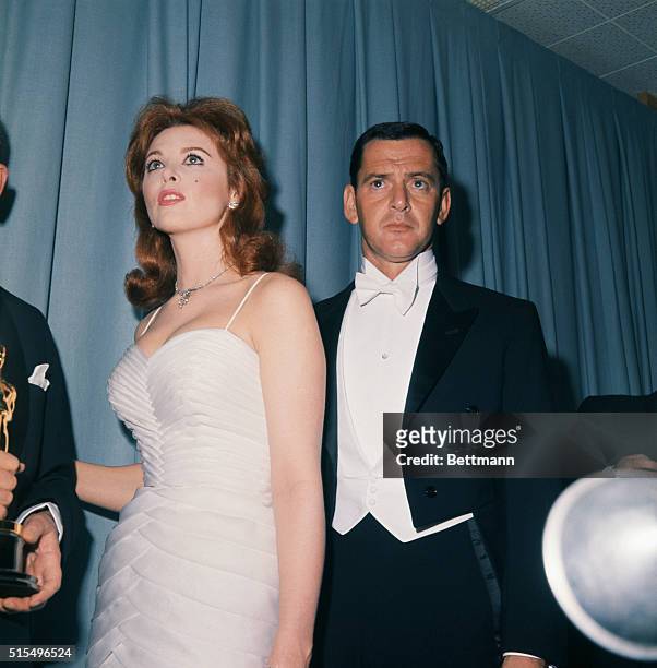 Annual Academy award presentations. Tina Louise and Tony Randall during awards. They presented for best achievement in art direction.