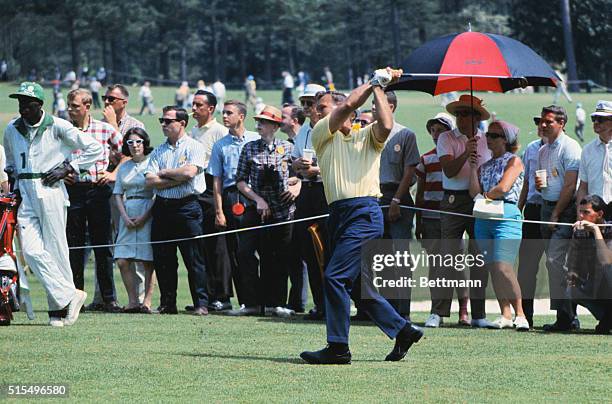 Augusta, Ga.: Arnold Palmer drive on the ninth hole in the second round of Masters Tournament action at the Augusta National Golf Club.