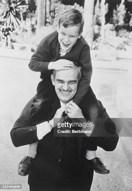 Prince And Son. Monaco: Prince Rainier of Monaco and his son Albert are shown in this photo from an article in the current issue of look Magazine...