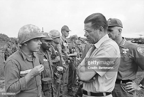 Bien Hoa, South Vietnam - Defense Secretary Robert S. McNamara gets a first-hand opinion on front line action from Lieutenant Van Buren Wake, Jr. ,...
