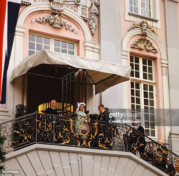 Visiting Bonn's City Hall May 19th, Britain's Queen Elizabeth waves to the crowd which had gathered to see her state visit. West German President...