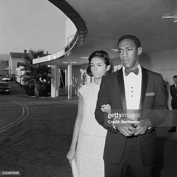 Hollywood, California: Actor Bill Cosby, of TV's I Spy series, is shown with his wife as they arrived for the Emmy Awards tonight.