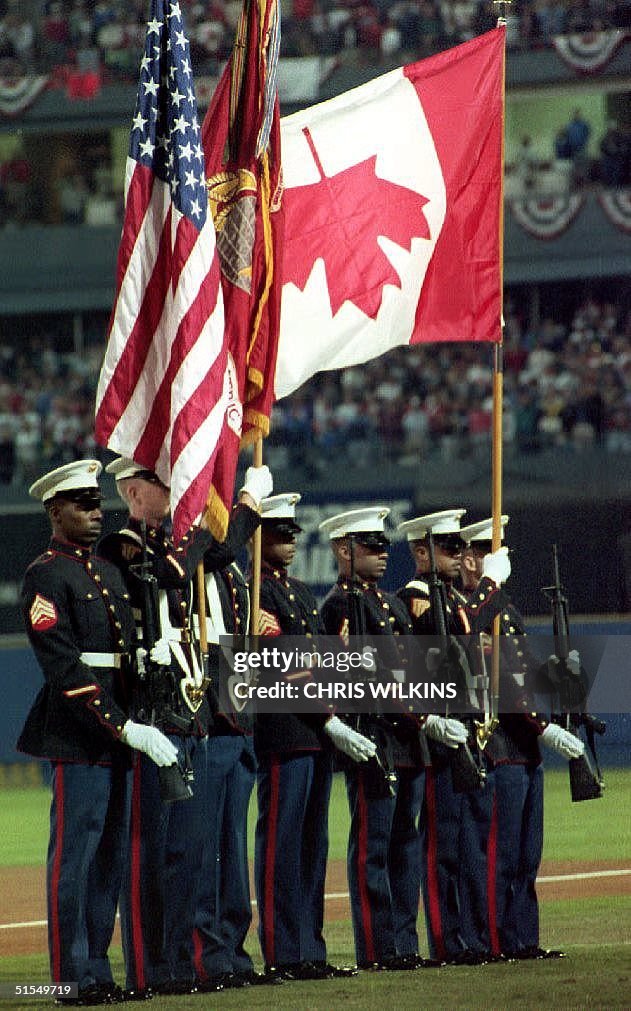 A U.S. military honor guard displays the Canadian