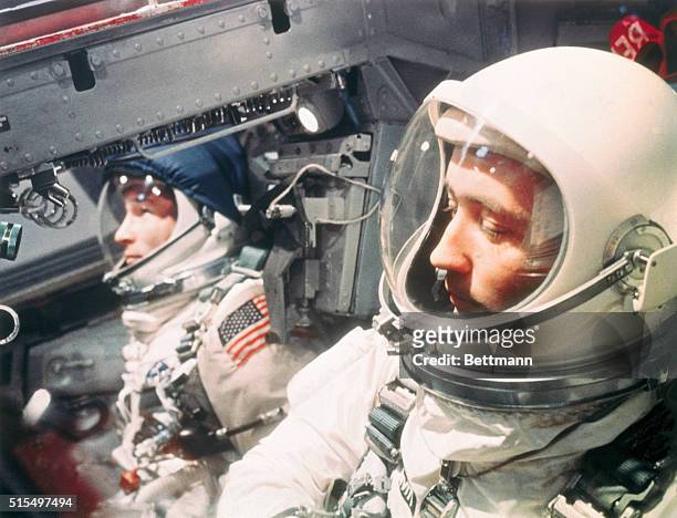 Cape Kennedy, Fla: Seated in their Gemini 4 capsule are Maj. McDivitt, right, and Maj. Edward White .