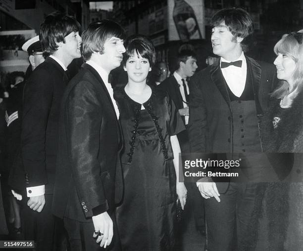 Beatles' New Movie. London: Three of the four Beatles arrive at the London Pavilion for the premiere of their new movie Help which was attended by...