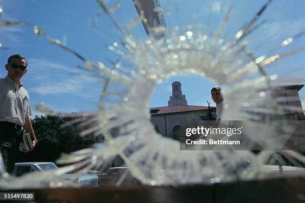 View of the tower where Charles Whitman carried out his sniper spree through a bullet hole in glass.