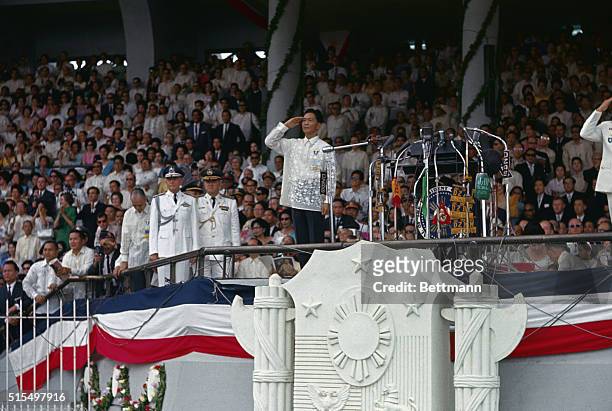 Manila, Philippines: General view of the 6th president of the Philippines, Ferdinand E. Marcos, on the reviewing stand during his inauguration...