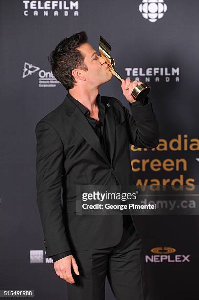 Yannick Bisson, winner of the Fan's Choice Award, poses in the press room at the 2016 Canadian Screen Awards at the Sony Centre for the Performing...