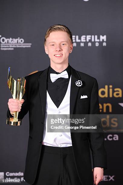 Nick Serino, winner of performance by an actor in a supporting role for Sleeping Giant, poses in the press room at the 2016 Canadian Screen Awards at...