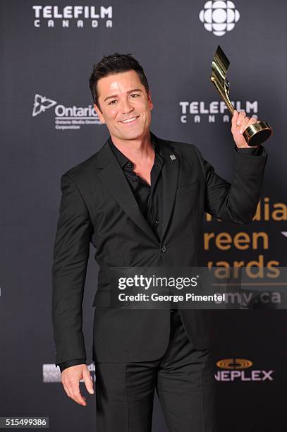 Yannick Bisson, winner of the Fan's Choice Award, poses in the press room at the 2016 Canadian Screen Awards at the Sony Centre for the Performing...