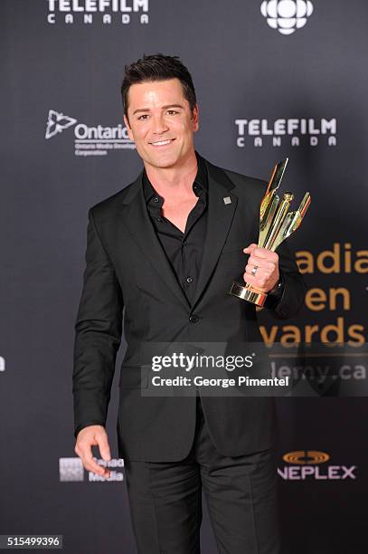 Yannick Bisson, winner of the Fan's Choice Award, poses in the press room at the 2016 Canadian Screen Awards at the Sony Centre for the Performing...