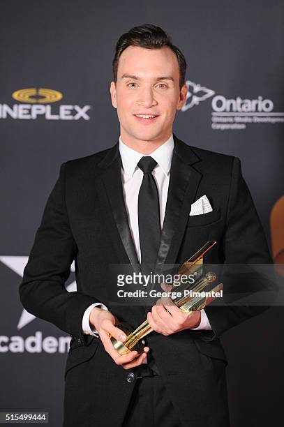 Ari Millen, winner of best performance by an actor in a continuing leading dramatic role for Orphan Black, poses in the press room at the 2016...