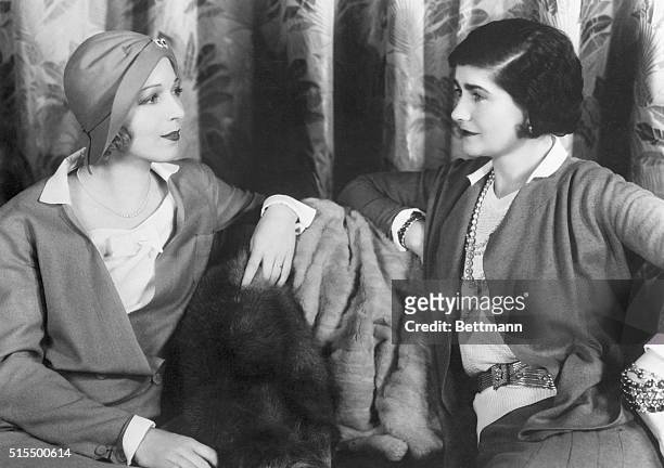 Mademoiselle Gabrielle Chanel, right, fashion expert, with actress Ina Claire.