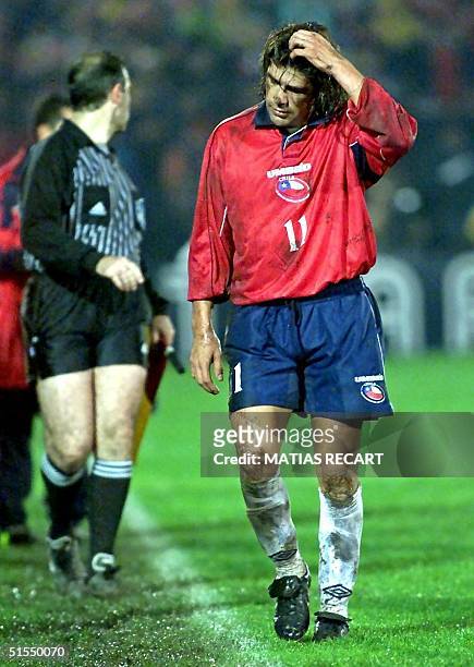 Chilean soccer star Marcelo Salas leaves the field after receiving a red card, during the elimination match between Chile and Paraguay 29 June, 2000...